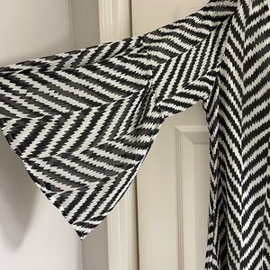 Women’s retro style mini dress, flare sleeves and low back